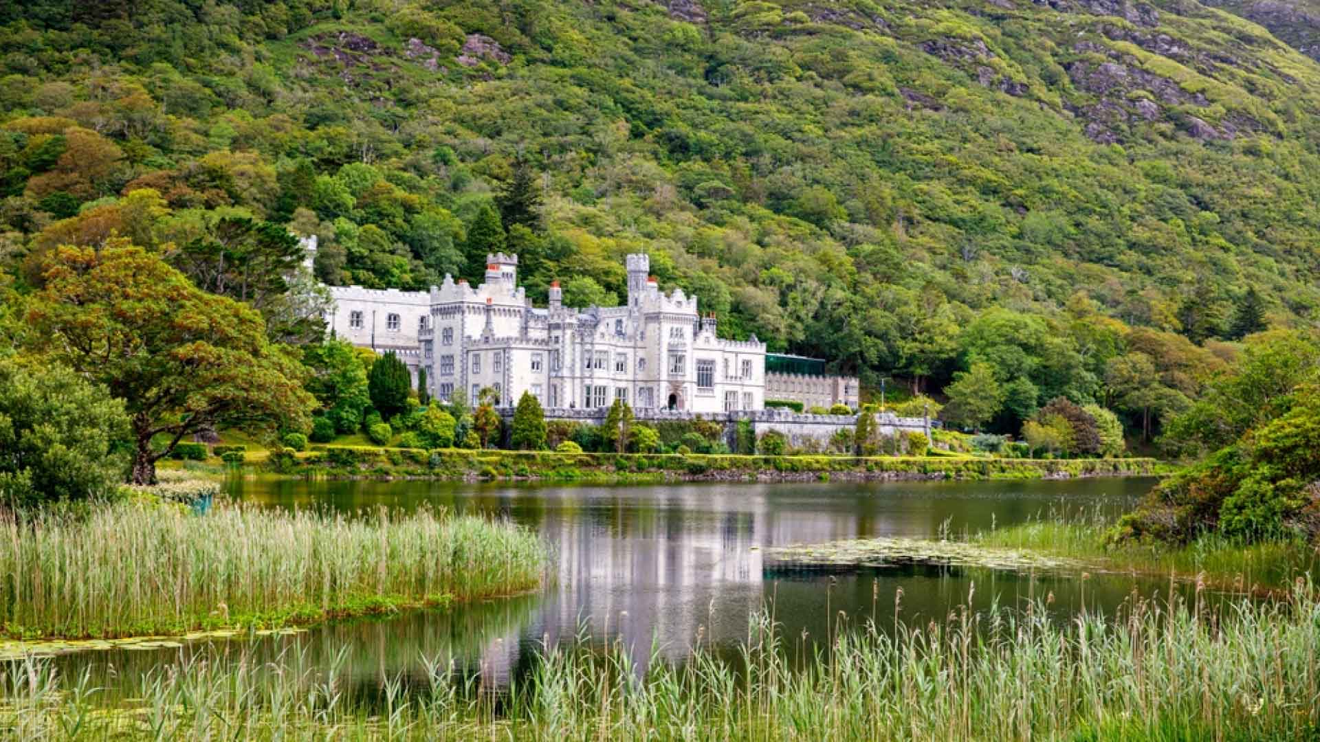 Kylemore Abbey beside a lake in Connemara