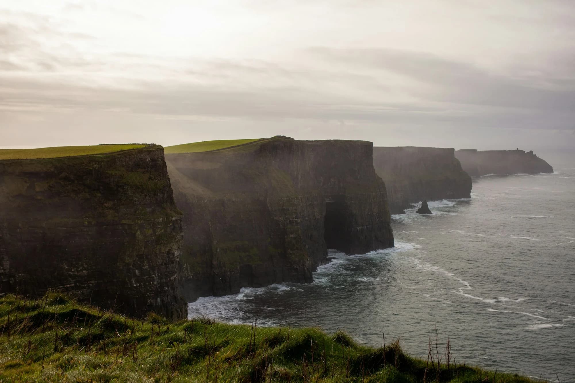 Green Atlantic cliffs on a western Ireland route from Shannon